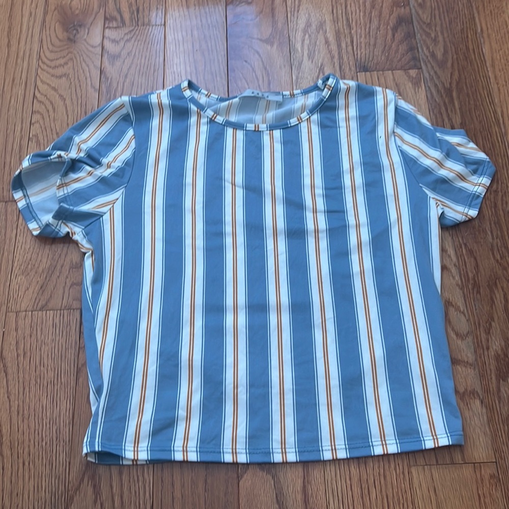 Cute stripped baby tee size medium and never worn.